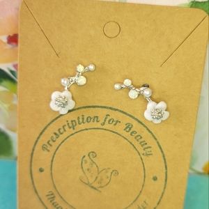 Silver earrings with white flowers and pearls
